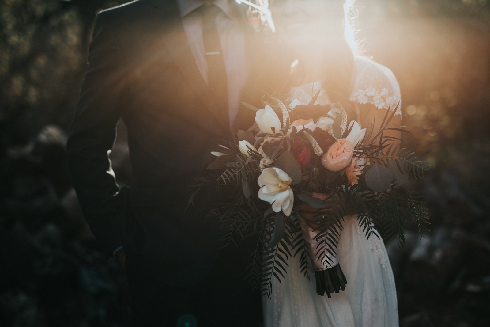 Newlywed couple walking together on their wedding day